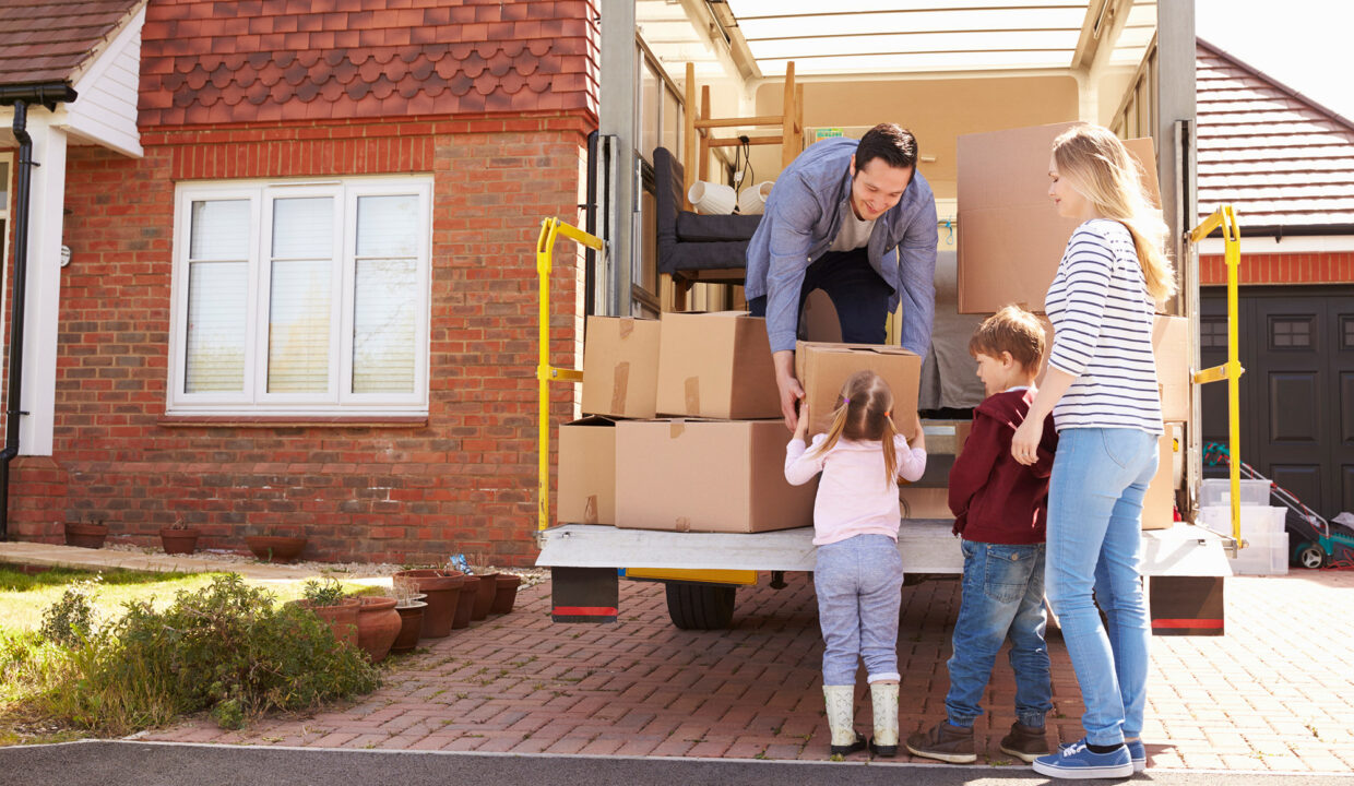 Family Help Unloads a Moving Truck