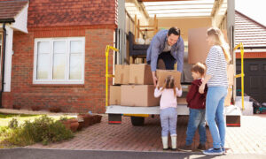 Family Help Unloads a Moving Truck
