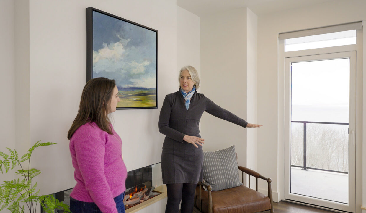 An Agent tour home for sale with a client