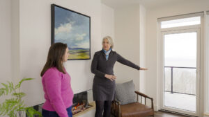 An Agent tour home for sale with a client