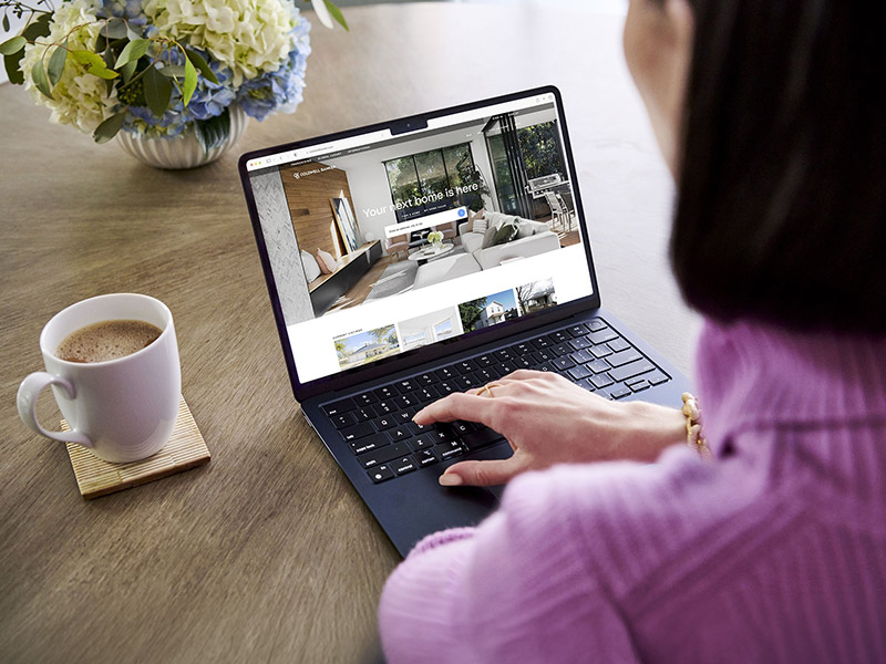 Woman searching online for an apartment